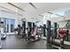 Spacious gym featuring various weight machines, treadmills, and large mirrors for a complete workout at 3325 Piedmont Ne Rd # 2501, Atlanta, GA 30305