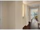Hallway featuring hardwood floors and modern lighting at 3325 Piedmont Ne Rd # 2501, Atlanta, GA 30305