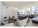 Bright lounge area featuring plush seating, modern lighting, and expansive windows with city views at 3325 Piedmont Ne Rd # 2501, Atlanta, GA 30305