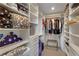 Spacious walk-in closet with custom shelving and storage, perfect for organizing clothing and accessories at 3325 Piedmont Ne Rd # 2501, Atlanta, GA 30305