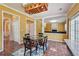Open kitchen area featuring breakfast nook and easy access to other rooms at 8965 Friarbridge Dr, Suwanee, GA 30024