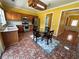 Eat-in kitchen with stainless appliances, granite counters, and stylish decor at 8965 Friarbridge Dr, Suwanee, GA 30024