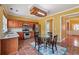 Bright kitchen area offering a breakfast area and stainless steel appliances at 8965 Friarbridge Dr, Suwanee, GA 30024