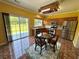 Bright kitchen features stainless appliances and a view of the backyard at 8965 Friarbridge Dr, Suwanee, GA 30024