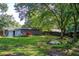 Spacious backyard with a patio area, perfect for enjoying outdoor relaxation and gatherings at 2619 Old Toney Rd, Ellenwood, GA 30294