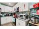 Well-equipped kitchen with granite countertops, stainless steel appliances, and updated cabinetry at 2619 Old Toney Rd, Ellenwood, GA 30294