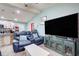 View of open layout between living room and kitchen featuring natural lighting at 2619 Old Toney Rd, Ellenwood, GA 30294