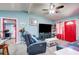Spacious living room with a comfortable sofa and stylish decor at 2619 Old Toney Rd, Ellenwood, GA 30294