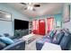 Comfortable living room featuring plush seating and a modern entertainment center at 2619 Old Toney Rd, Ellenwood, GA 30294