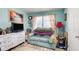 Inviting living room with cozy seating, a TV, and natural light at 2619 Old Toney Rd, Ellenwood, GA 30294