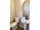 Bathroom featuring a pedestal sink, modern faucet, and neutral wall color at 2748 Farmstead Ct, Grayson, GA 30017