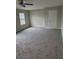 Carpeted bedroom with neutral walls and a ceiling fan at 2748 Farmstead Ct, Grayson, GA 30017