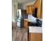 Kitchen featuring stainless steel appliances, wood cabinets, and white countertops at 2748 Farmstead Ct, Grayson, GA 30017