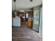 A warm kitchen featuring stainless steel appliances, wood floors, and generous counterspace at 2748 Farmstead Ct, Grayson, GA 30017