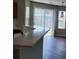 A cozy kitchen featuring a breakfast bar and sliding glass doors at 2748 Farmstead Ct, Grayson, GA 30017