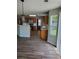 A warm kitchen featuring stainless steel appliances, wood floors, and generous counterspace at 2748 Farmstead Ct, Grayson, GA 30017