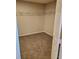 Empty walk-in closet with carpet floor and wire shelving at 2748 Farmstead Ct, Grayson, GA 30017