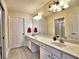 Spacious bathroom featuring dual sinks, a large mirror, and ample counter space at 2730 Vintage Reserve Ln, Marietta, GA 30066