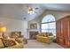 Inviting living room featuring a fireplace, comfortable seating, and natural lighting at 2730 Vintage Reserve Ln, Marietta, GA 30066