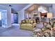 Cozy living room with direct access to the kitchen and sunroom, plus comfortable seating at 2730 Vintage Reserve Ln, Marietta, GA 30066