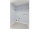 Walk-in closet with wire shelving and laundry connections, providing convenient storage and functionality at 2886 Webb Bridge Rd, Alpharetta, GA 30009