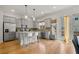 Modern kitchen with stainless steel appliances, gray cabinets, and a breakfast bar at 613 Harrington Hls, Decatur, GA 30032