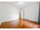 Spacious bedroom featuring a ceiling fan, and hardwood floors at 1131 Hershey Dr, Marietta, GA 30062