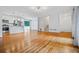 Open-concept living space with kitchen featuring hardwood floors and ample natural light at 1131 Hershey Dr, Marietta, GA 30062