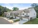 Charming townhomes with two-car garages, neutral colors, and tasteful brick and siding accents in a well-maintained community at 1317 Aura Ln, Lawrenceville, GA 30045