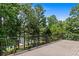 This beautiful deck overlooks mature trees and provides a great outdoor living space at 55 Moray Pl, Covington, GA 30014