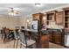 Eat-in kitchen featuring granite counters, stainless appliances, and ample cabinet space at 55 Moray Pl, Covington, GA 30014