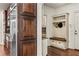 Mudroom with built-in storage and seating at 55 Moray Pl, Covington, GA 30014