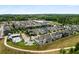 Picturesque aerial view of a well-planned community with various home styles and a community pool at 6320 Halcyon Garden Dr, Alpharetta, GA 30005