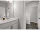 Bathroom with white sink and cabinet at 6320 Halcyon Garden Dr, Alpharetta, GA 30005