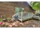 Back porch with railing needs repairs and clean up to make it more inviting and enjoyable space at 652 Post Oak Rd, Jonesboro, GA 30238