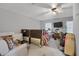 Spacious bedroom with large windows, featuring a bed, furniture, and ample natural light at 652 Post Oak Rd, Jonesboro, GA 30238
