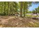 Cozy single-story home surrounded by mature trees, offering a peaceful and secluded environment at 652 Post Oak Rd, Jonesboro, GA 30238