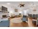 Spacious living room with hardwood floors, a fireplace, and abundant seating perfect for relaxation and entertaining at 652 Post Oak Rd, Jonesboro, GA 30238