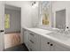 Modern bathroom features a dual vanity, large mirror, and a view into the Primary bedroom at 779-A Lynwood Se St, Atlanta, GA 30312
