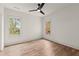 Inviting bedroom with hardwood floors, a ceiling fan, and plenty of natural light at 779-A Lynwood Se St, Atlanta, GA 30312