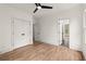 Bright bedroom with hardwood floors and double doors with black hardware at 779-A Lynwood Se St, Atlanta, GA 30312