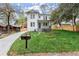 Charming two-story home with a well-manicured lawn, beautiful landscaping, and inviting front porch at 779-A Lynwood Se St, Atlanta, GA 30312