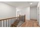 Hallway with hardwood floors and neutral decor that provides an airy and open feel at 779-A Lynwood Se St, Atlanta, GA 30312