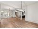 Bright open-concept living room with hardwood floors and modern light fixtures at 779-A Lynwood Se St, Atlanta, GA 30312