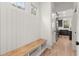Mudroom with bench, storage space, coat hooks, and access to the kitchen at 779-A Lynwood Se St, Atlanta, GA 30312