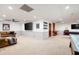 Finished basement with large screen tv, plush couches, a pool table, and recessed lighting at 1642 Reflections Trl, Powder Springs, GA 30127