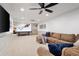 Finished basement features a large screen tv, comfortable sectional, plush blankets, and recessed lighting at 1642 Reflections Trl, Powder Springs, GA 30127