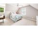 Bright bedroom with a large bed, fresh blankets, and dual windows, showcasing comfort and natural light at 1642 Reflections Trl, Powder Springs, GA 30127