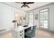 Well-lit office space with white trim, featuring a comfortable blue chair at 1642 Reflections Trl, Powder Springs, GA 30127