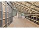 Spacious attic shows framed construction with insulation and metal framework at 1730 Etchison Spur, Loganville, GA 30052
